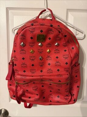 MCM Red Logo Studded Leather Mini Backpack